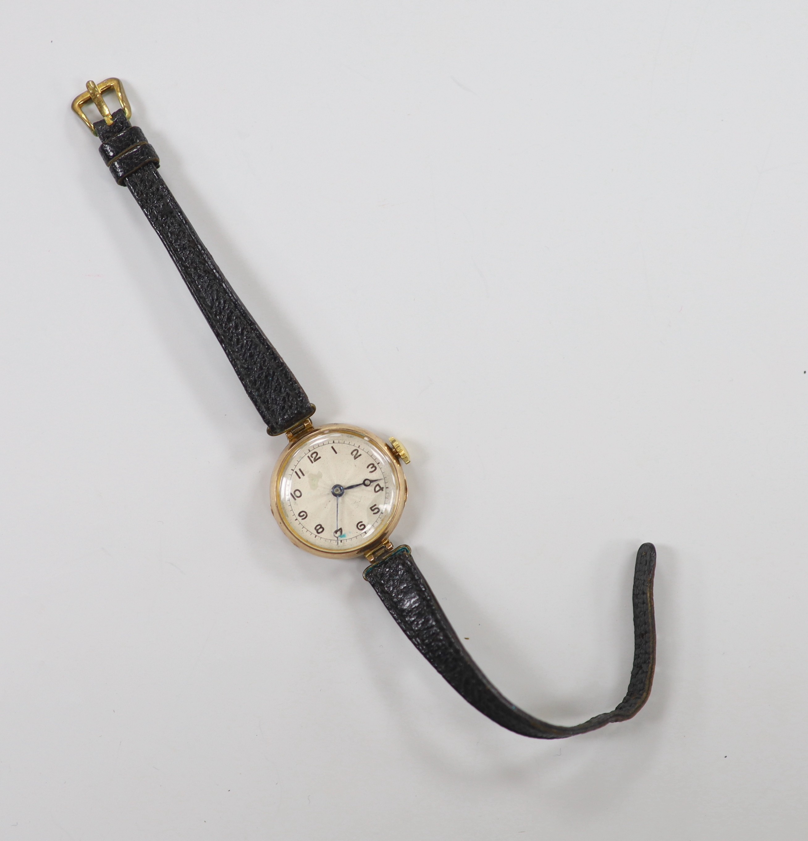 A lady's late 1920's 9ct gold Rolex manual wind wrist watch, with sunburst Arabic dial, on associated leather strap, case diameter 27mm and a fob watch.